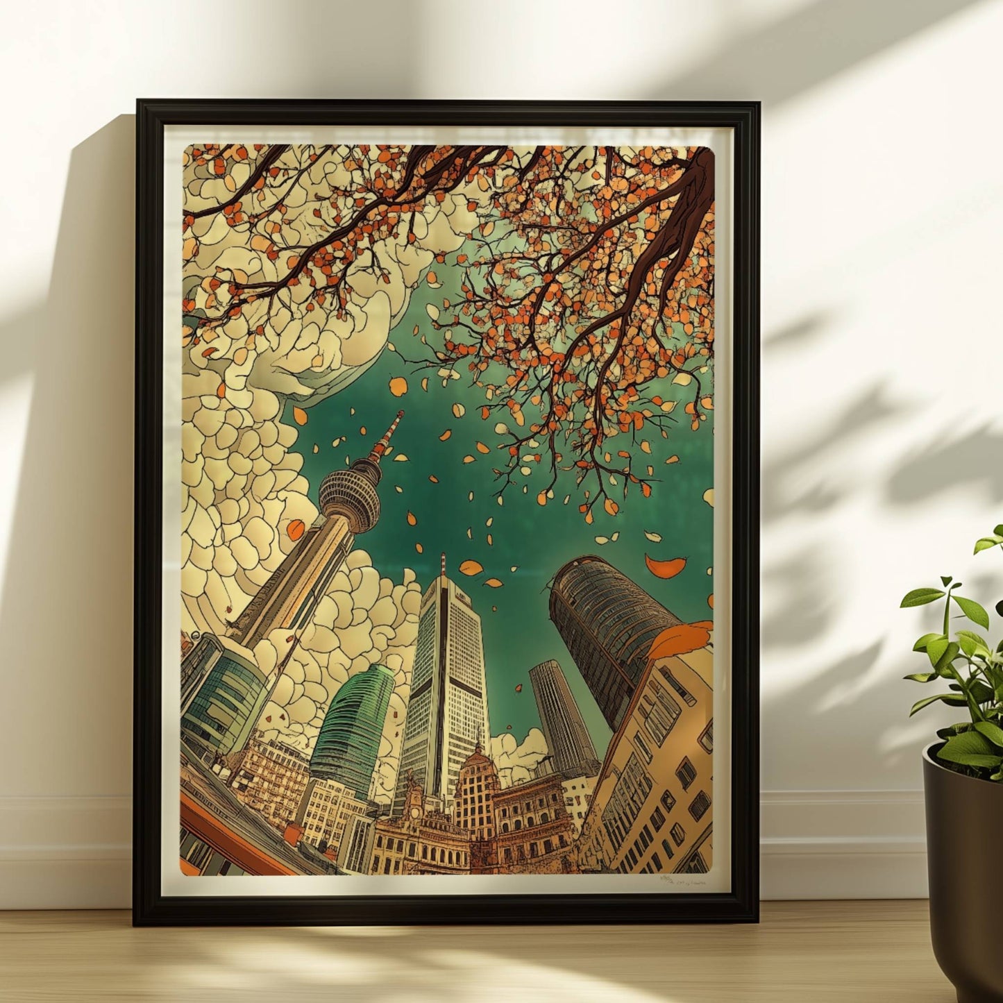 Blick nach oben auf Frankfurter Skyline mit modernen Hochhäusern, Fernsehturm und herbstlichen fallenden Blättern vor dramatischen Wolken.. Rahmen schwarz 30x40