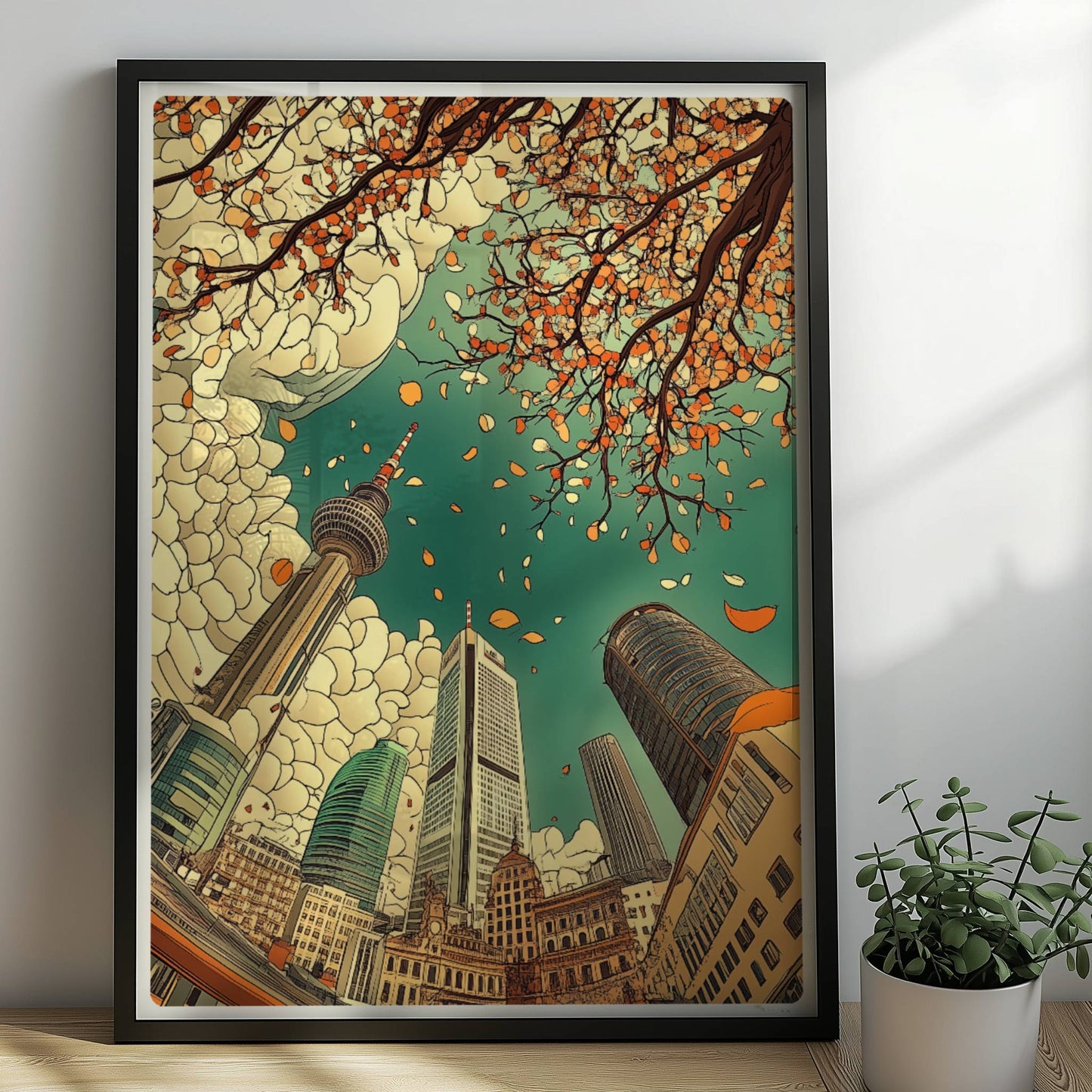 Blick nach oben auf Frankfurter Skyline mit modernen Hochhäusern, Fernsehturm und herbstlichen fallenden Blättern vor dramatischen Wolken.. Rahmen schwarz 50x70