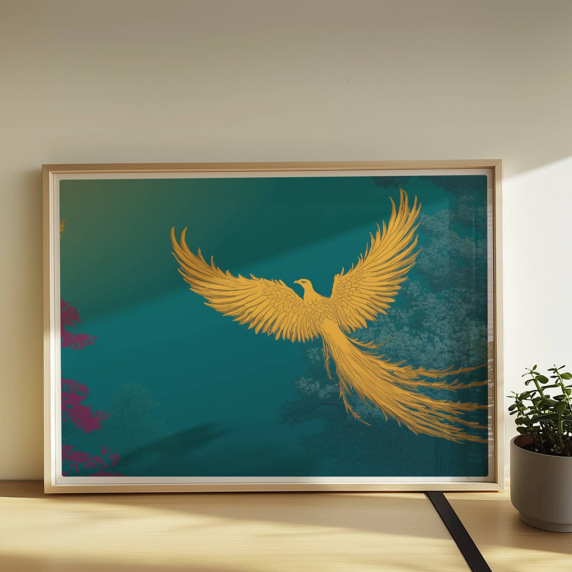 Goldener Phönix mit ausgebreiteten Flügeln, der aus dem Schatten über einen mystischen Wald fliegt, in kräftigen Türkis- und Grüntönen.. Rahmen natur 70x50