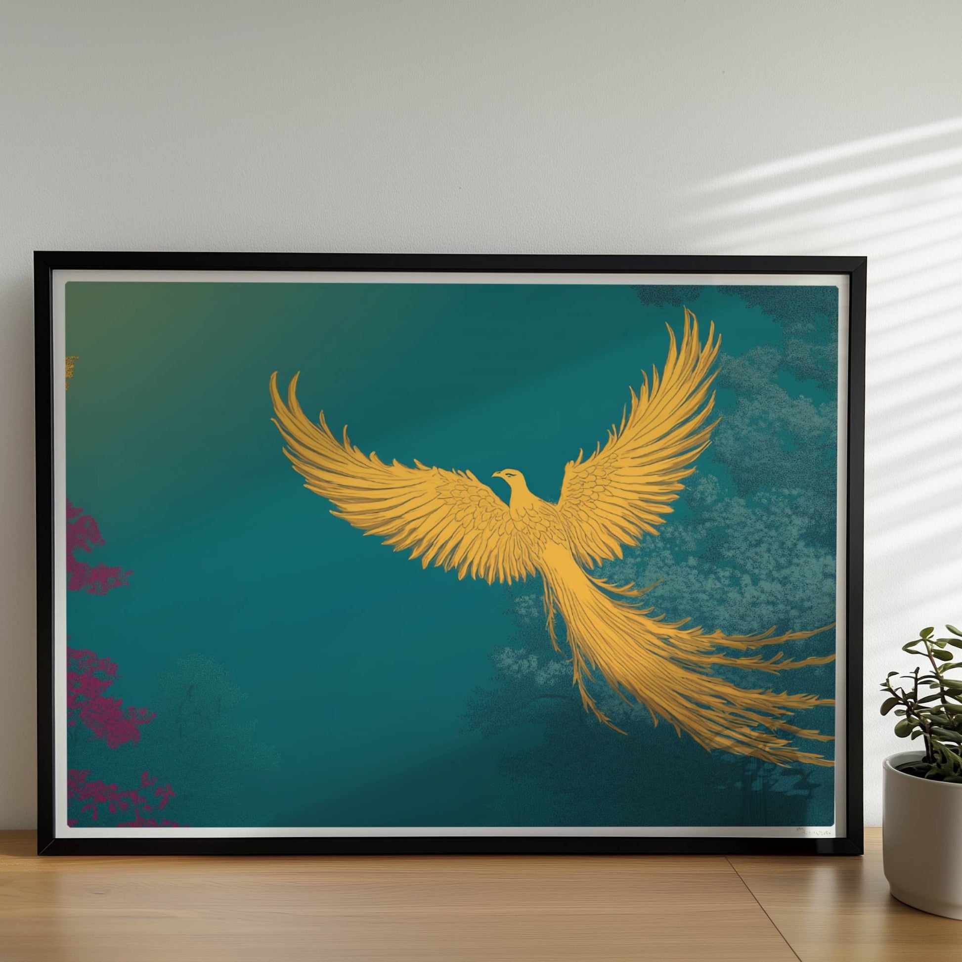 Goldener Phönix mit ausgebreiteten Flügeln, der aus dem Schatten über einen mystischen Wald fliegt, in kräftigen Türkis- und Grüntönen.. Rahmen schwarz 70x50