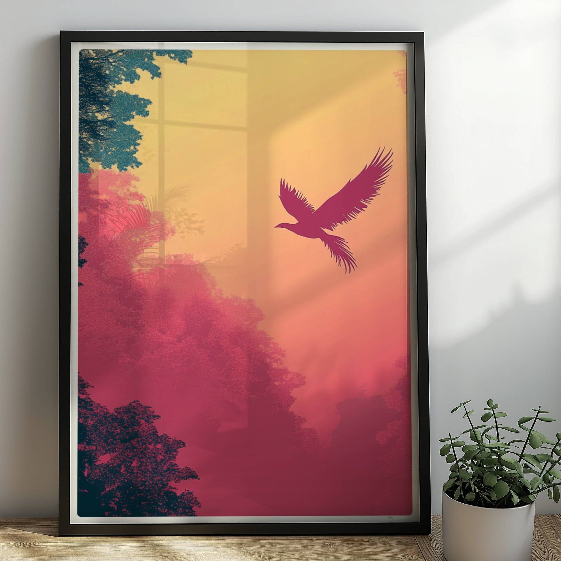 Stilisierter Phönix fliegt über nebeligen, pastellfarbenen Bäumen im Sonnenaufgang – harmonische Farben von Rosa bis Gelb.. Rahmen schwarz 50x70
