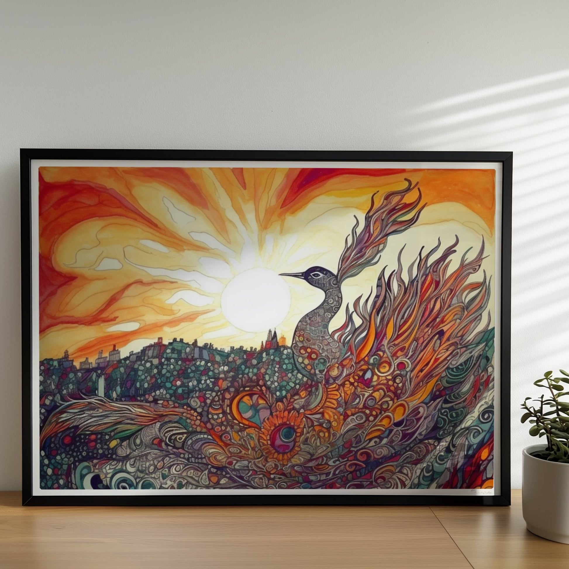 Phönix mit prachtvollen, ornamentalen Federn in leuchtenden Farben, vor einer Sonnenuntergangslandschaft im Jugendstil.. Rahmen schwarz 70x50