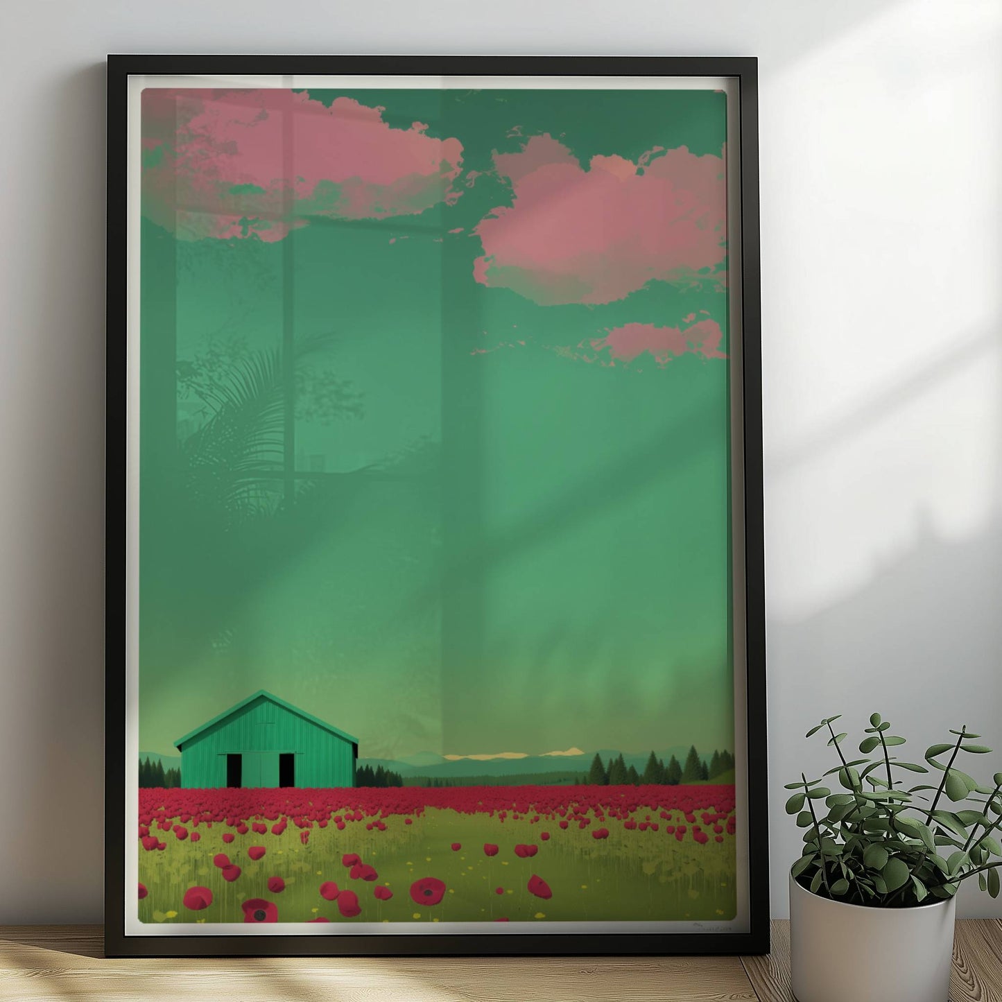 Grüne Scheune vor einem weiten Mohnblumenfeld mit rosa Wolken – friedliche Landschaft in warmen Tönen.. Rahmen schwarz 50x70