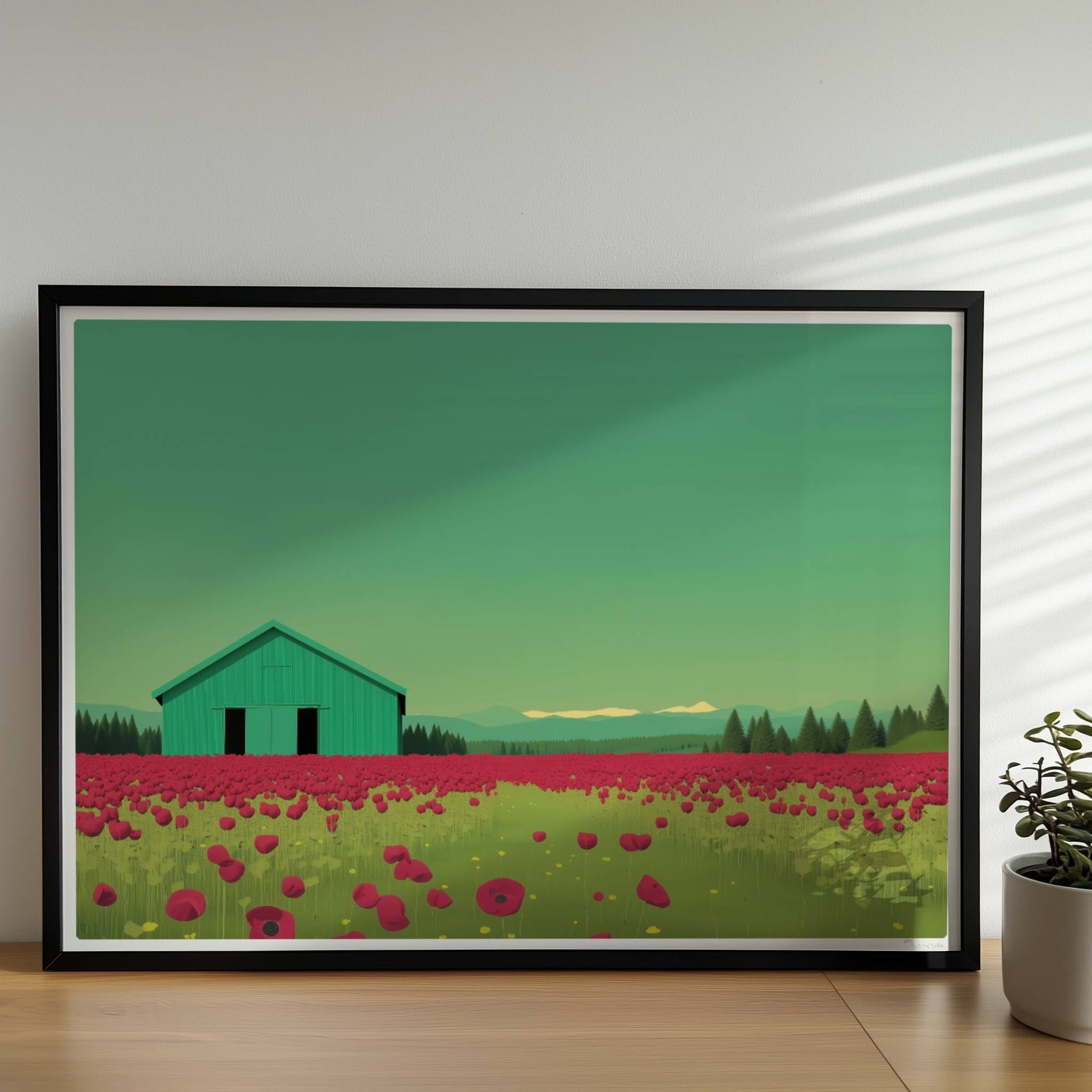 Grüne Scheune vor einem weiten Mohnblumenfeld mit rosa Wolken – friedliche Landschaft in warmen Tönen.. Rahmen schwarz 70x50