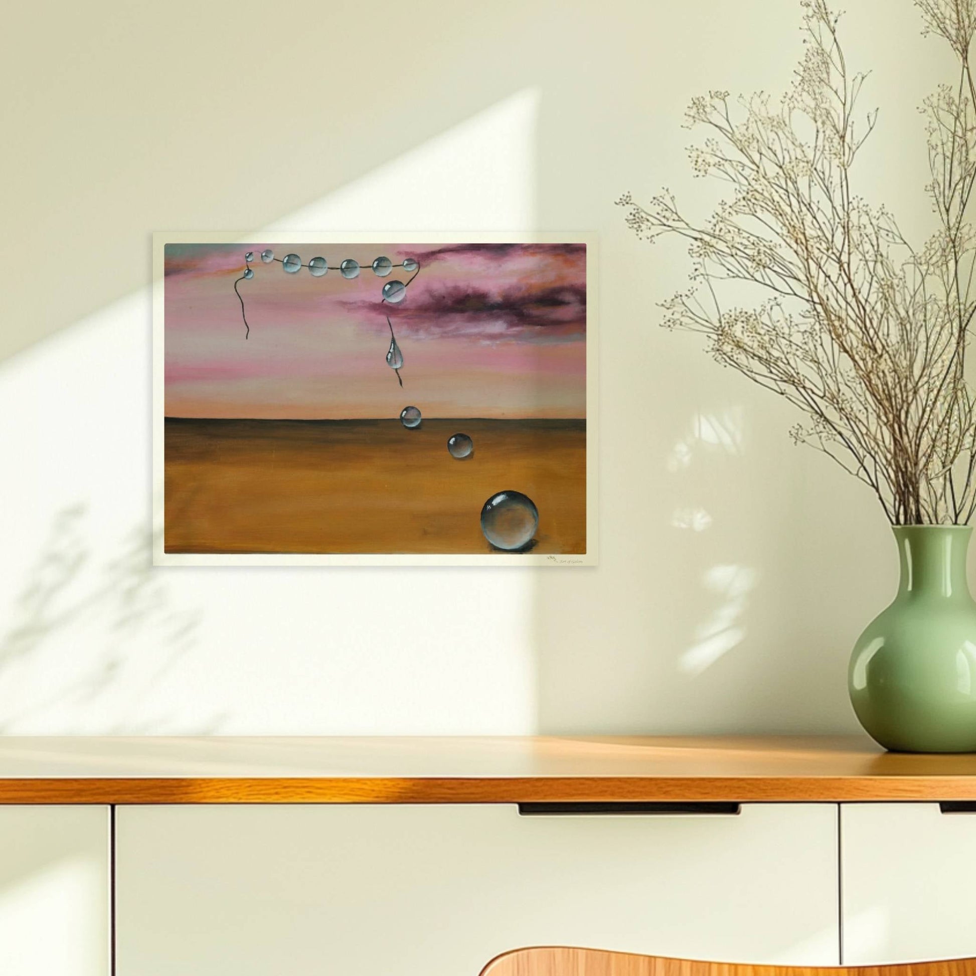 13 schwebende Glastropfen vor rosarotem Himmel über Wüste.. Ohne Rahmen 40x30