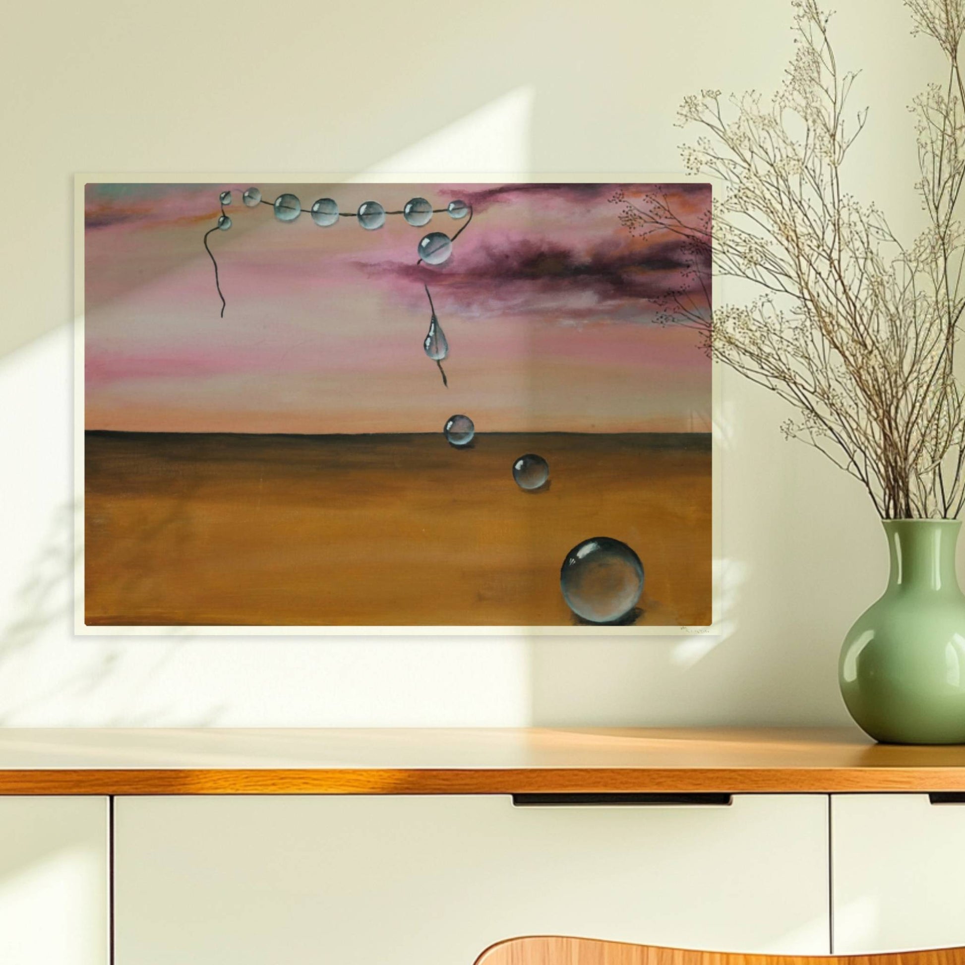 13 schwebende Glastropfen vor rosarotem Himmel über Wüste.. Ohne Rahmen 70x50