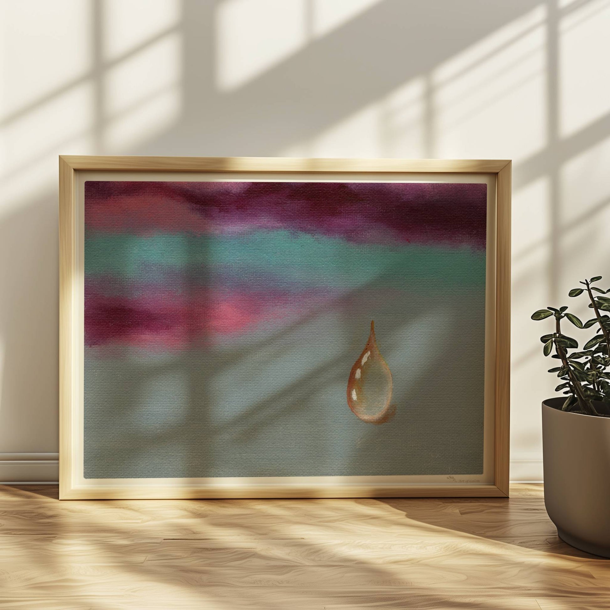 Goldener Tropfen vor dramatischem Himmel in Violett und Türkis.. Rahmen natur 40x30