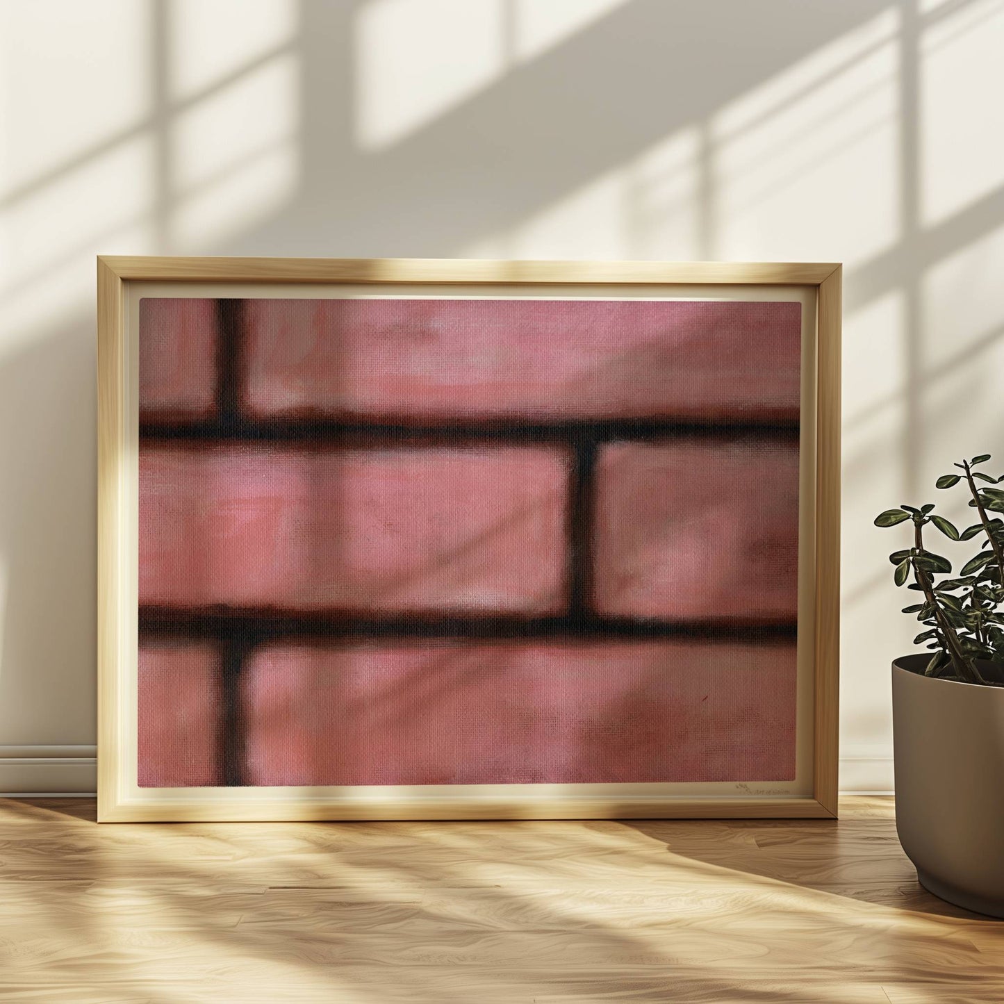 Rosafarbene Ziegelwand mit weichen Kanten und künstlerischem Flair.. Rahmen natur 40x30