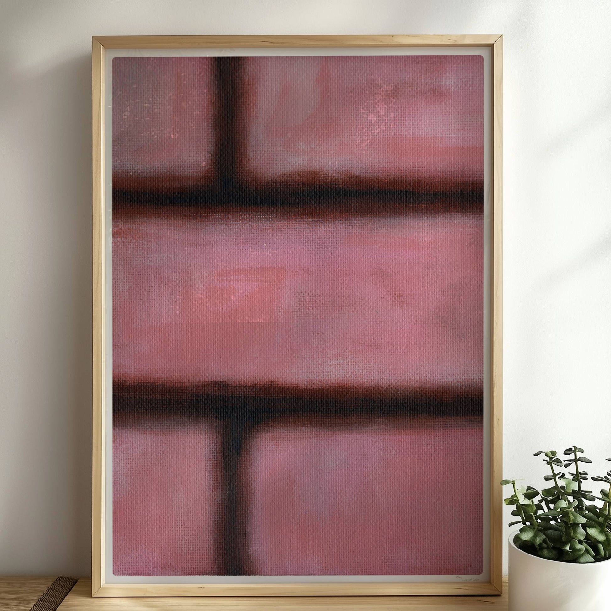 Rosafarbene Ziegelwand mit weichen Kanten und künstlerischem Flair.. Rahmen natur 50x70