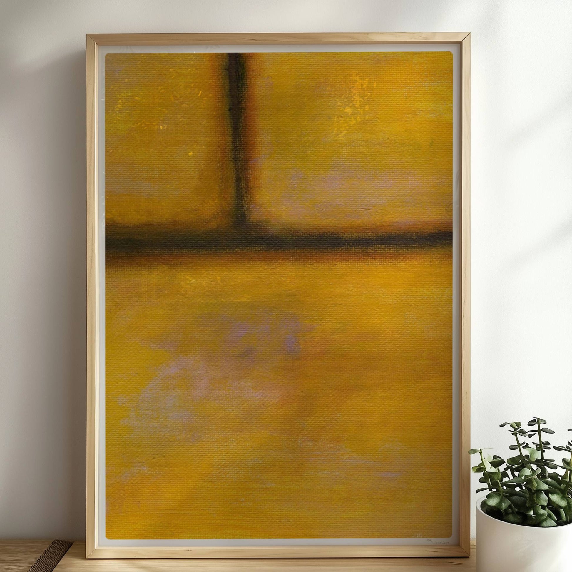 Gelbe Ziegelwand mit warmen Farbverläufen und Struktur.. Rahmen natur 50x70