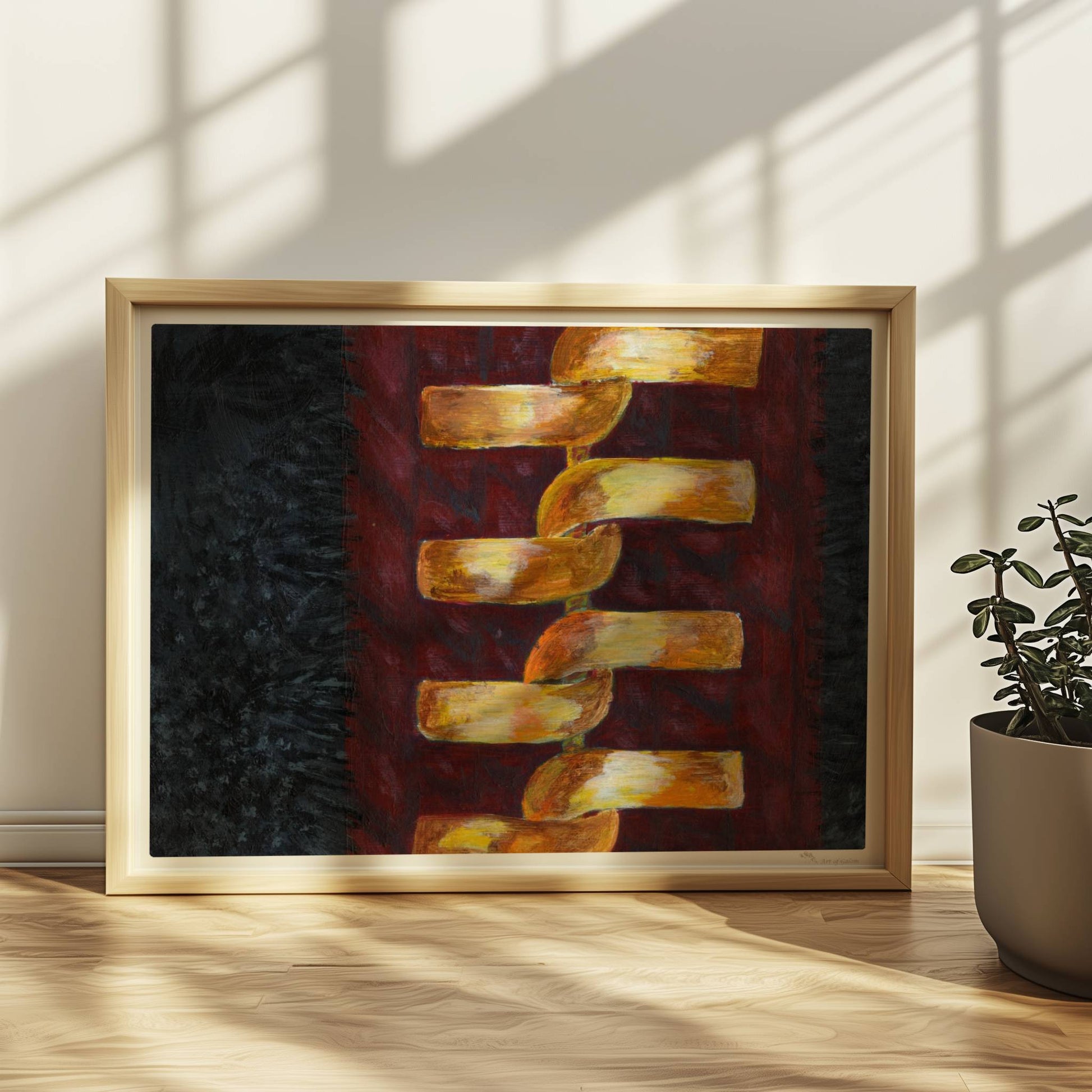 Goldene abstrakte Kette auf rotem Stoffhintergrund – modisch und modern.. Rahmen natur 40x30