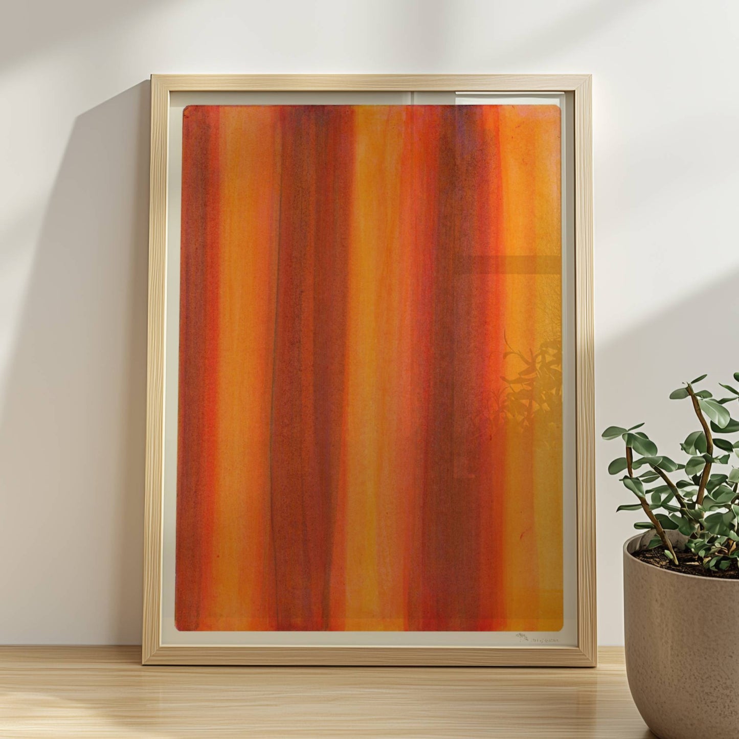 Vertikale Streifen in leuchtendem Orange, Rot und Gelb erzeugen eine abstrakte Wandwirkung mit Wärme und Energie.. Rahmen natur 30x40