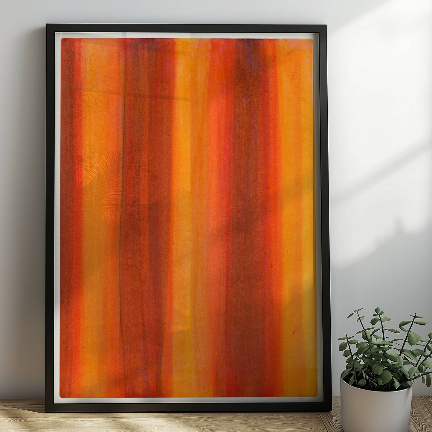 Vertikale Streifen in leuchtendem Orange, Rot und Gelb erzeugen eine abstrakte Wandwirkung mit Wärme und Energie.. Rahmen schwarz 50x70