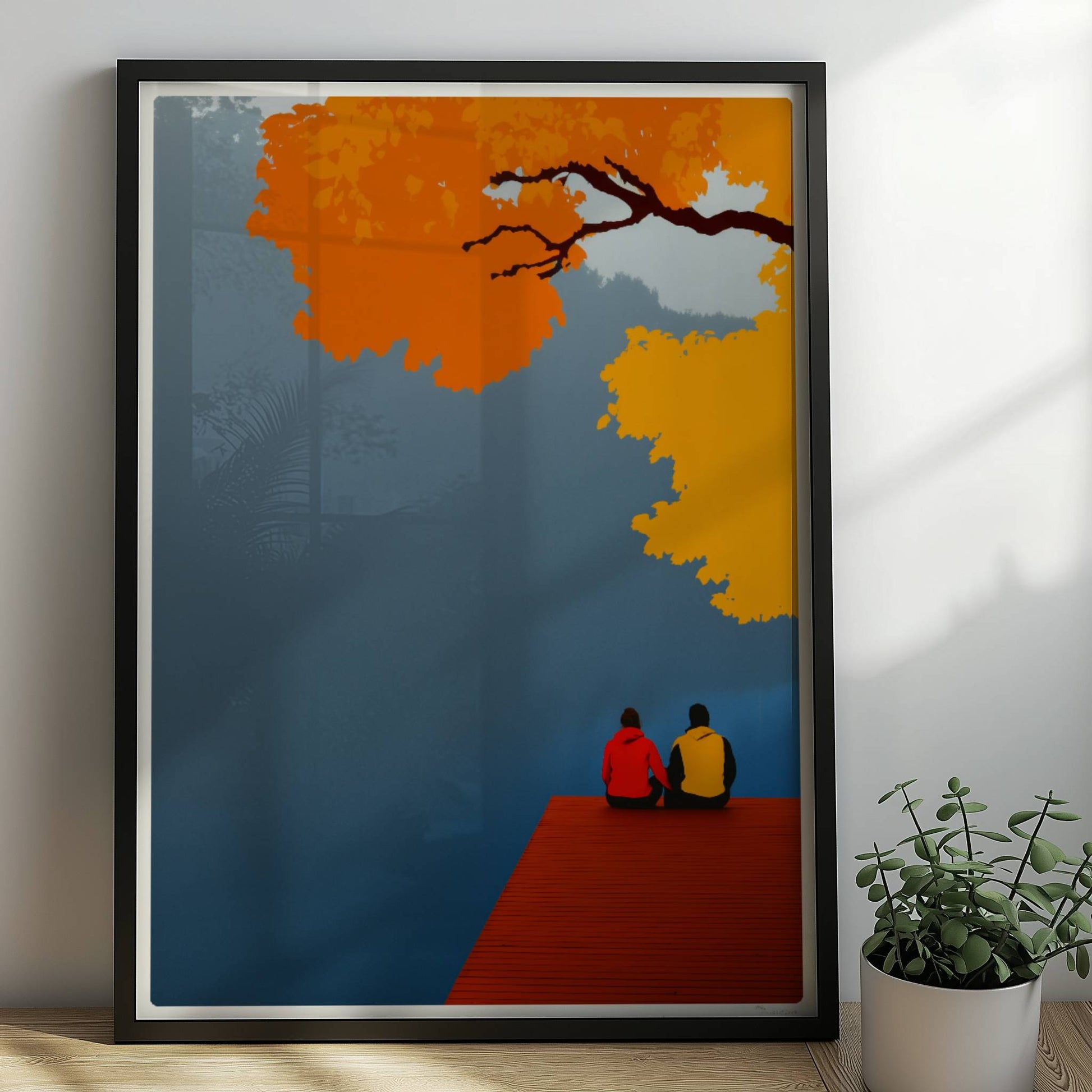 Zwei Personen sitzen auf einem roten Steg an einem nebligen See, überragt von herbstlich orange-gelben Baumkronen.. Rahmen schwarz 50x70