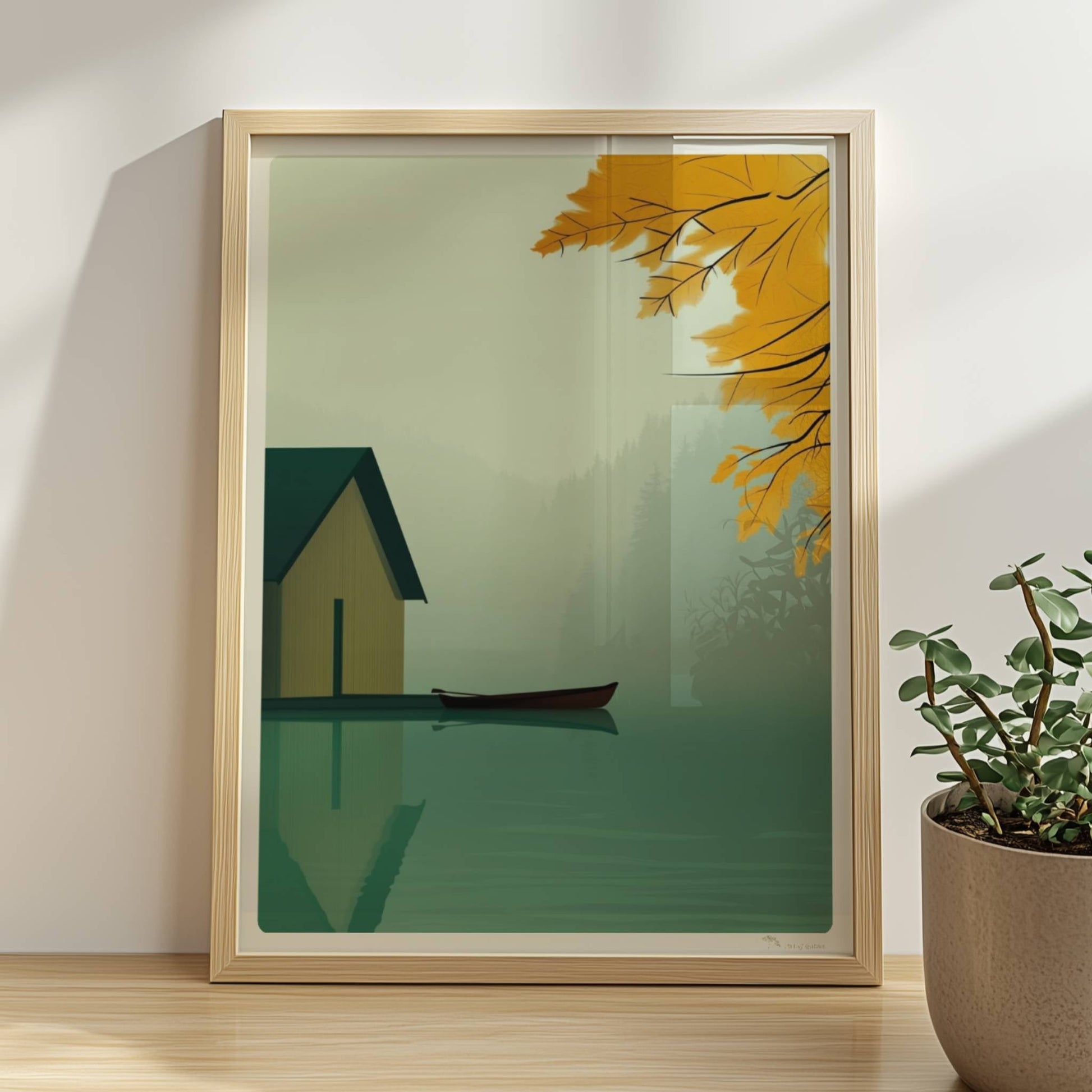 Stillleben eines Bootshauses mit Ruderboot auf einem nebligen See, eingerahmt von gelbem Herbstlaub.. Rahmen natur 30x40