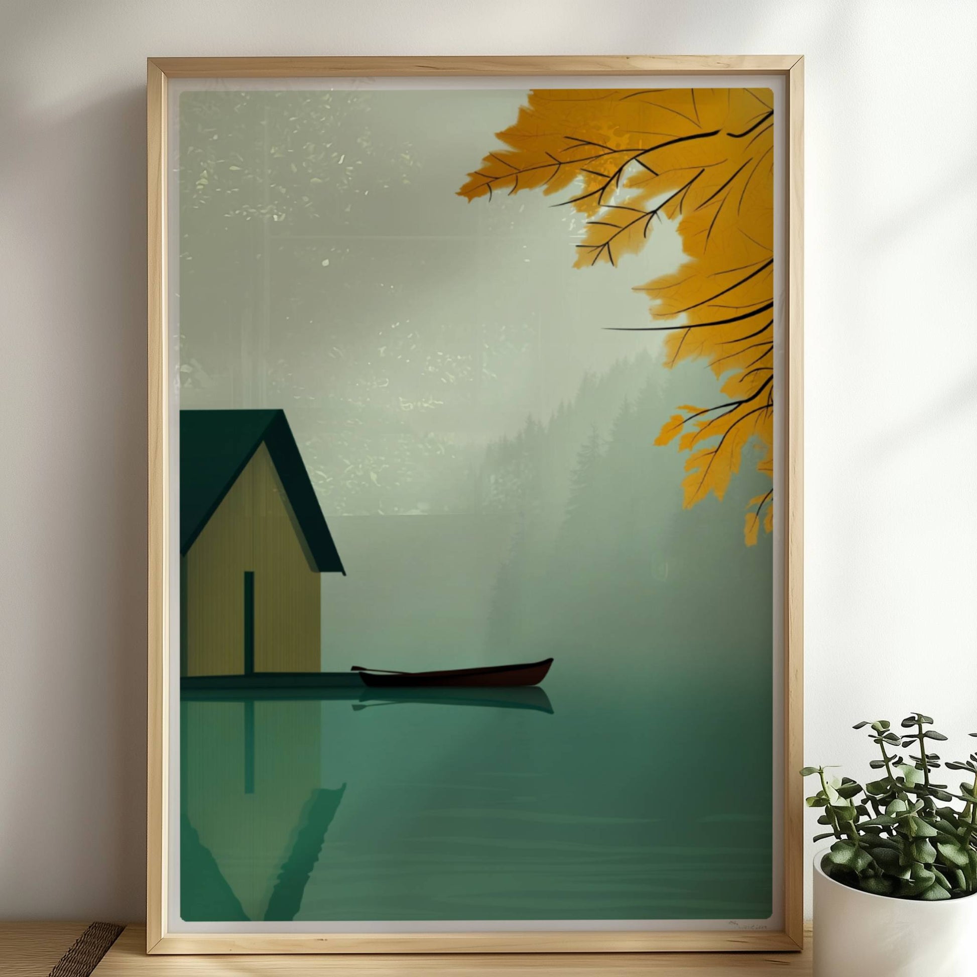 Stillleben eines Bootshauses mit Ruderboot auf einem nebligen See, eingerahmt von gelbem Herbstlaub.. Rahmen natur 50x70