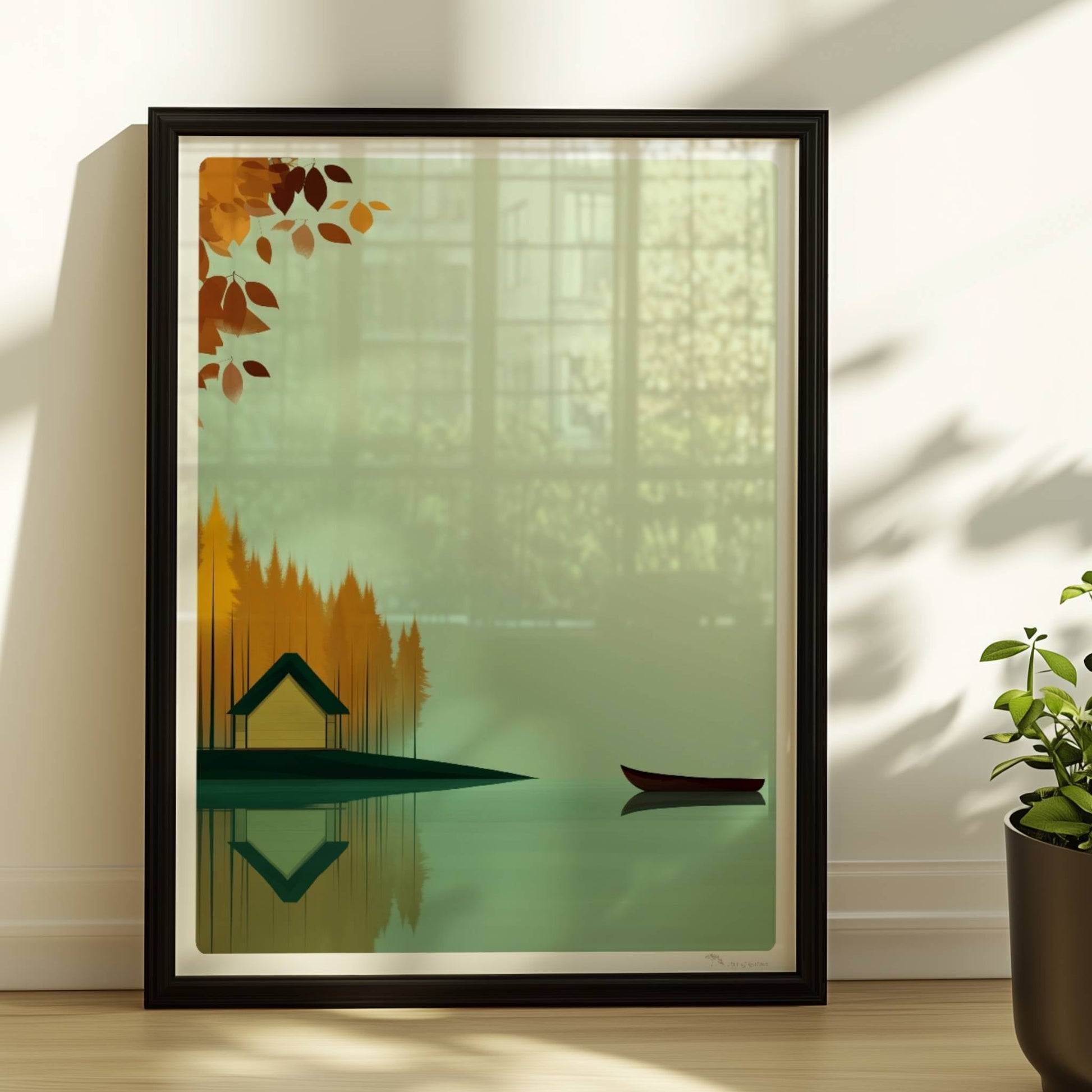 Gelbes Häuschen am See mit grünem Dach, umgeben von herbstlichen Bäumen und einem ruhigen Kanu auf spiegelndem Wasser.. Rahmen schwarz 30x40