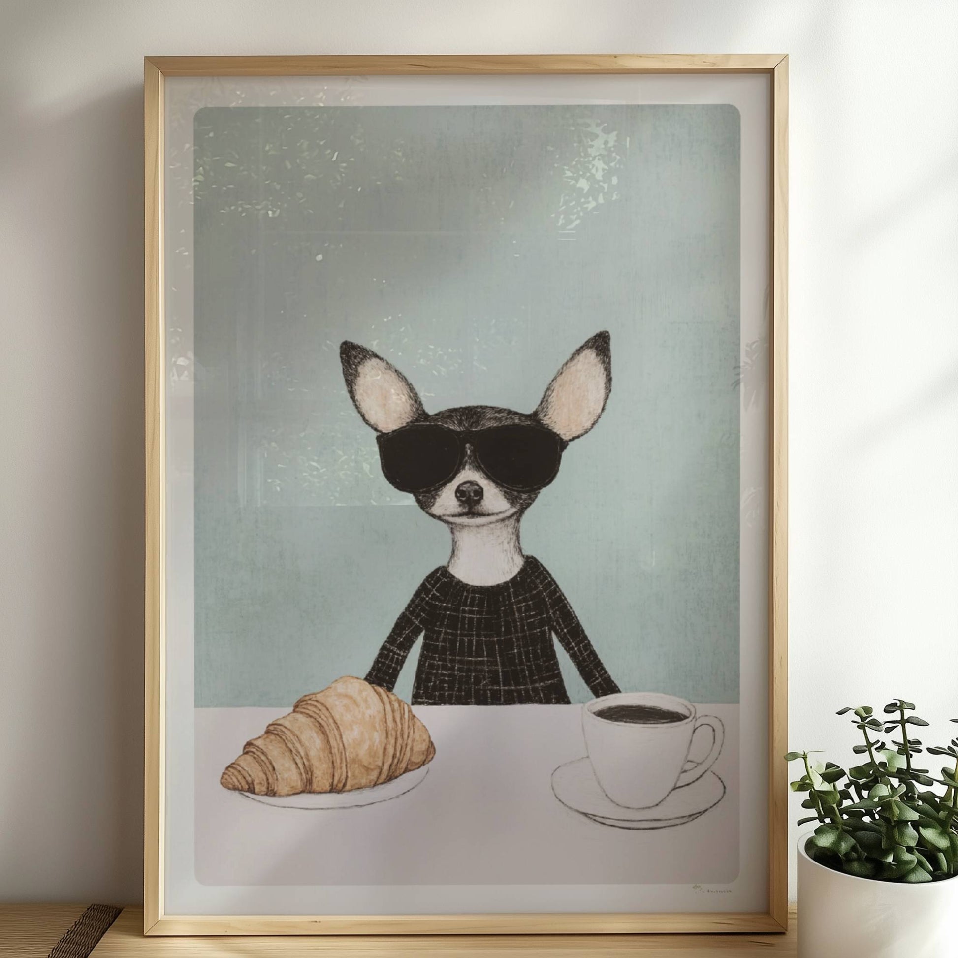 Chihuahua mit Sonnenbrille, Kaffee und Croissant. Rahmen natur 50x70