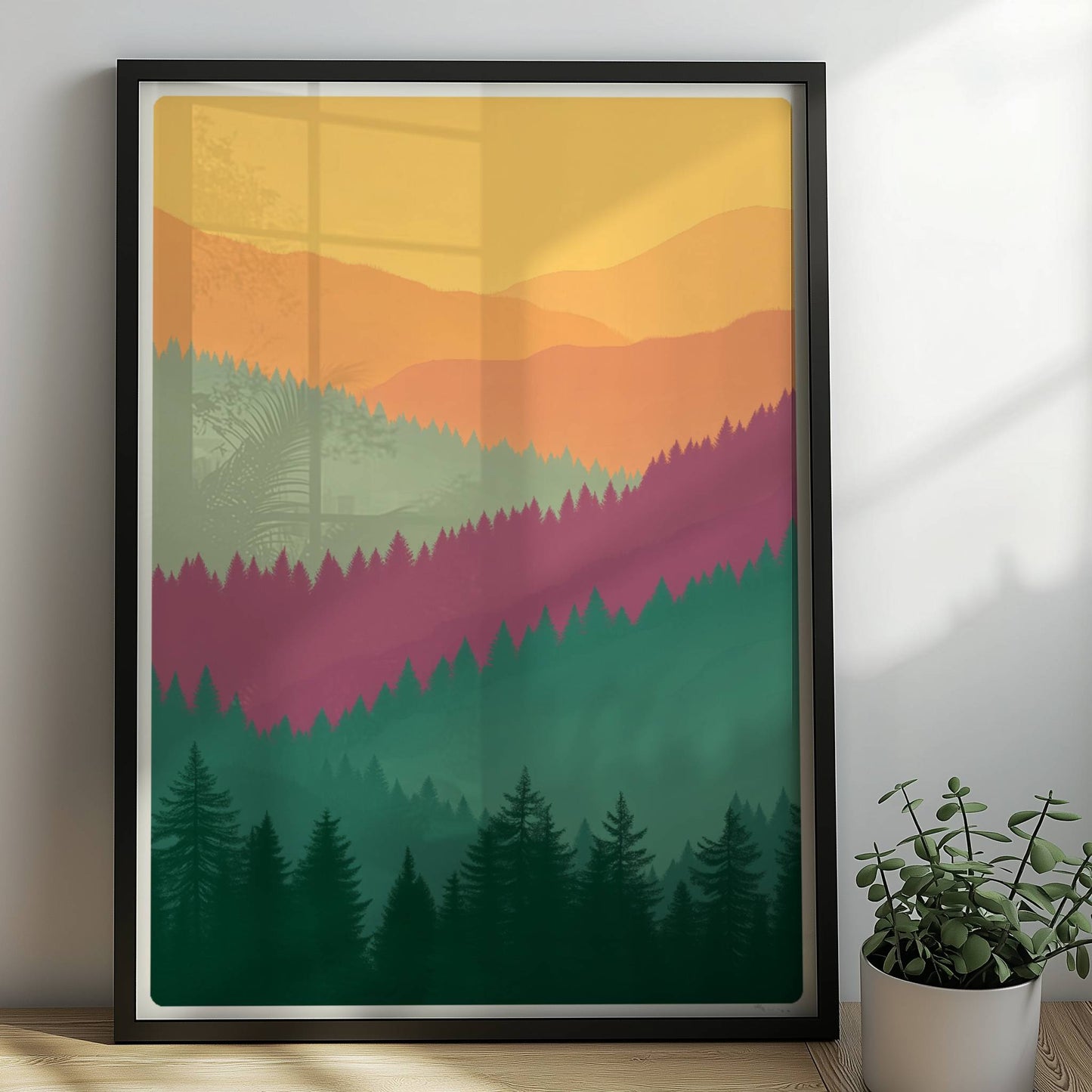 Hügelige Waldsilhouetten im Sonnenuntergang.. Rahmen schwarz 50x70
