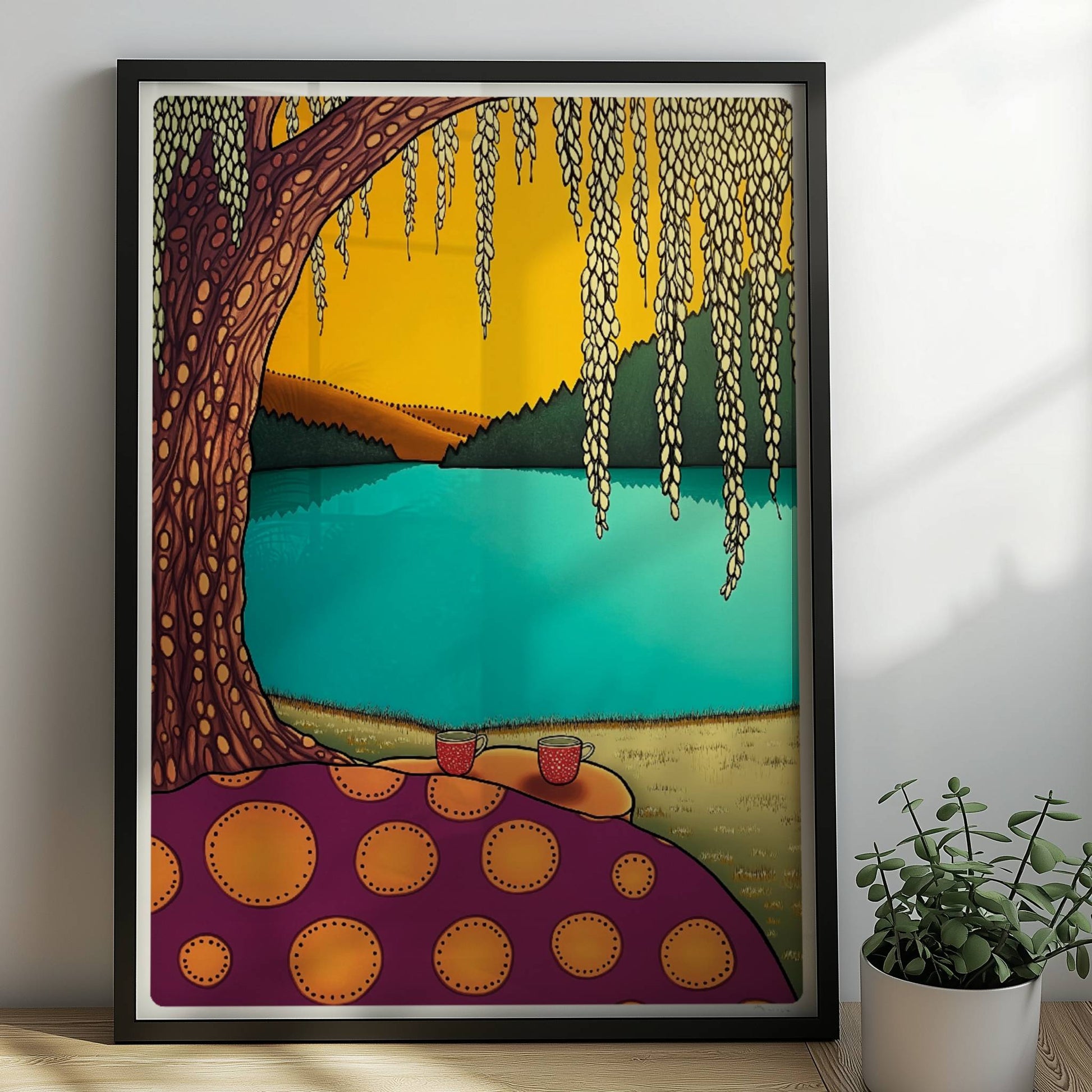Picknick am See mit ruhigem Wasser und natürlicher Uferlandschaft, sonniger Himmel und friedliche Atmosphäre.. Rahmen schwarz 50x70