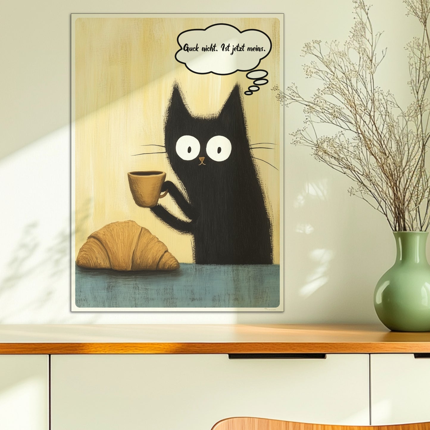 Schwarze Katzen mit großen Augen und frechem Spruch. Sprechblase mit Text "Guck nich. Ist jetzt meins"